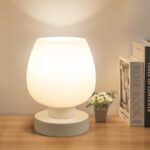 Touchscreen bedside lamp, compact.