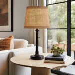 Small black table lamp with fabric shade.