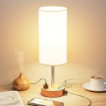 Dimmable touch bedside lamp with USB-C and AC socket.